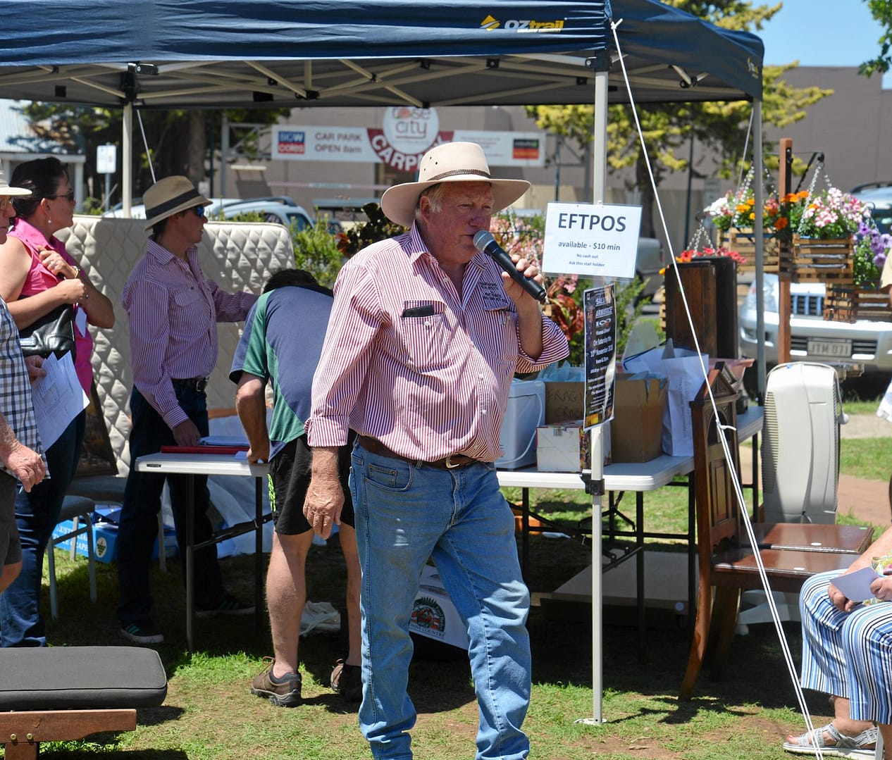 Stuart Bond looks for bids in the auction at the Warwick Uniting Church Spring Fair.